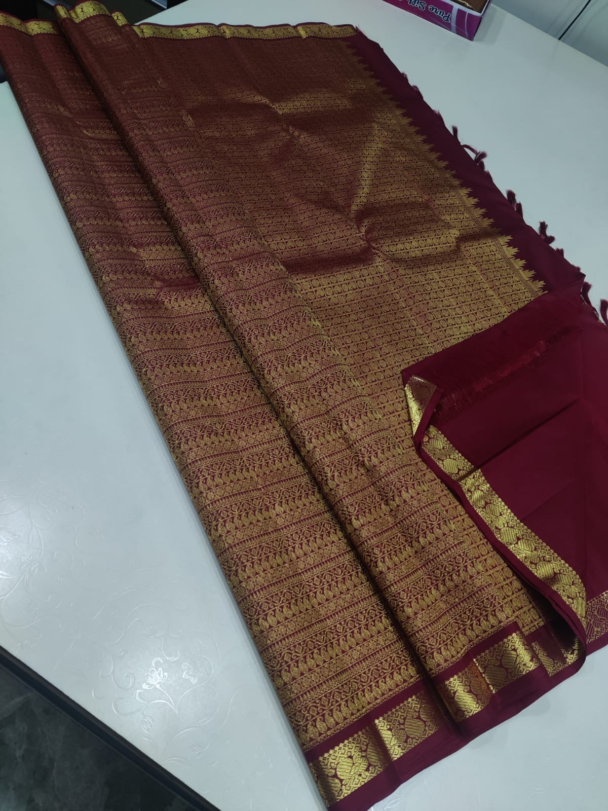 Maroon Pure Silk Kanjivaram Saree with all over Zari Motifs